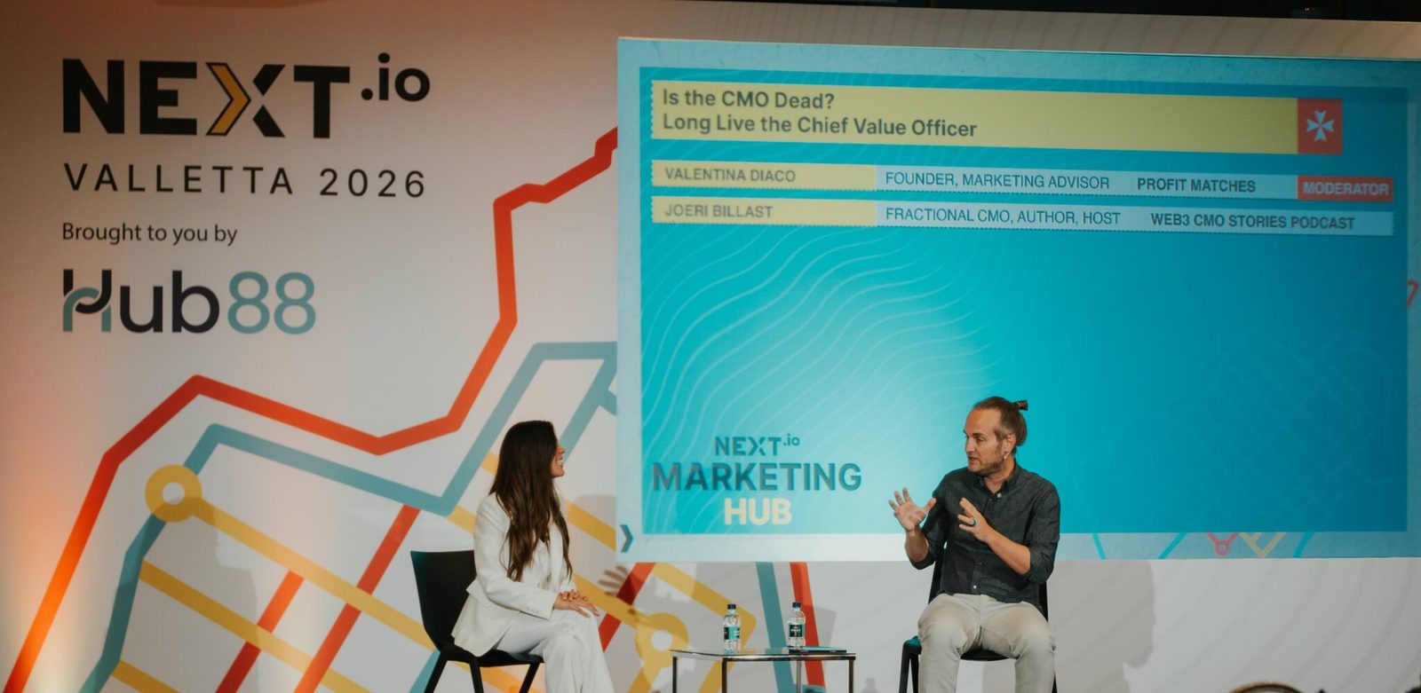 Joeri Billast in a fireside chat on the NEXT Summit stage in Valletta with moderator Valentina Diaco